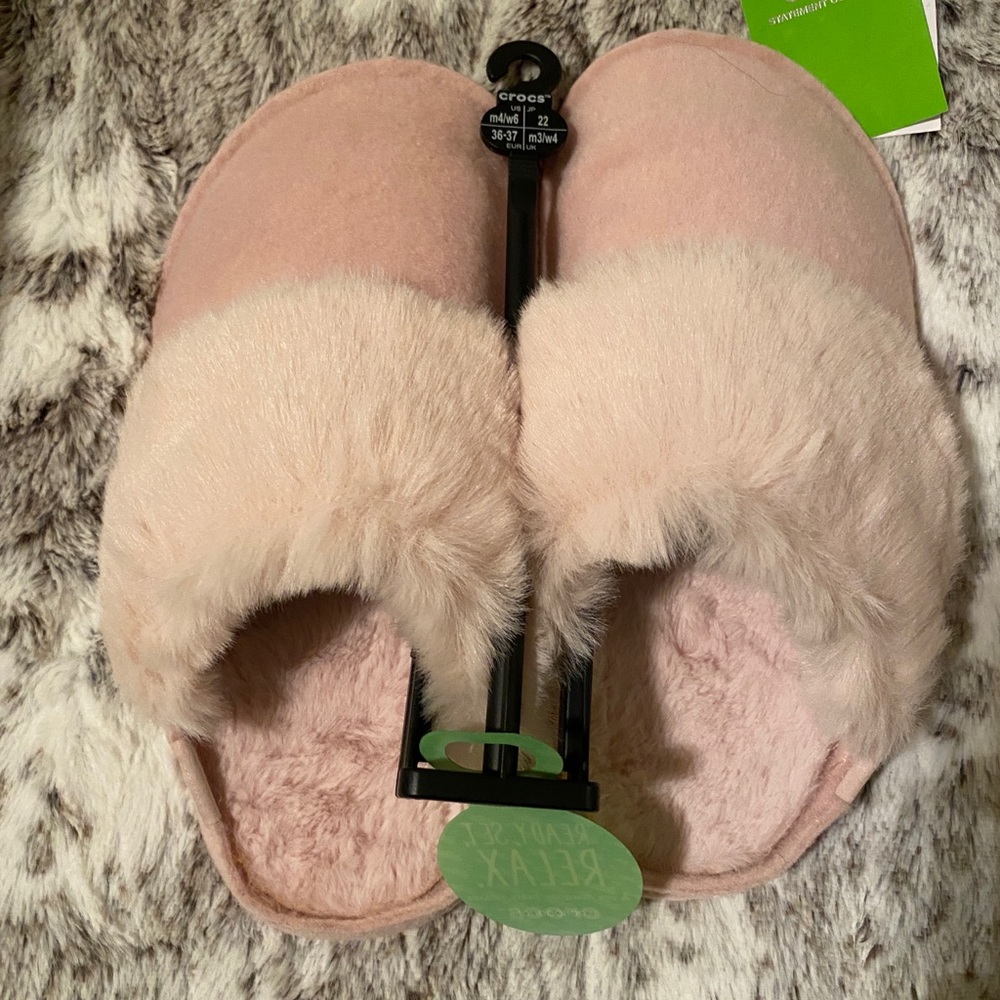 Pink crocs slippers.  Fuzzy!!